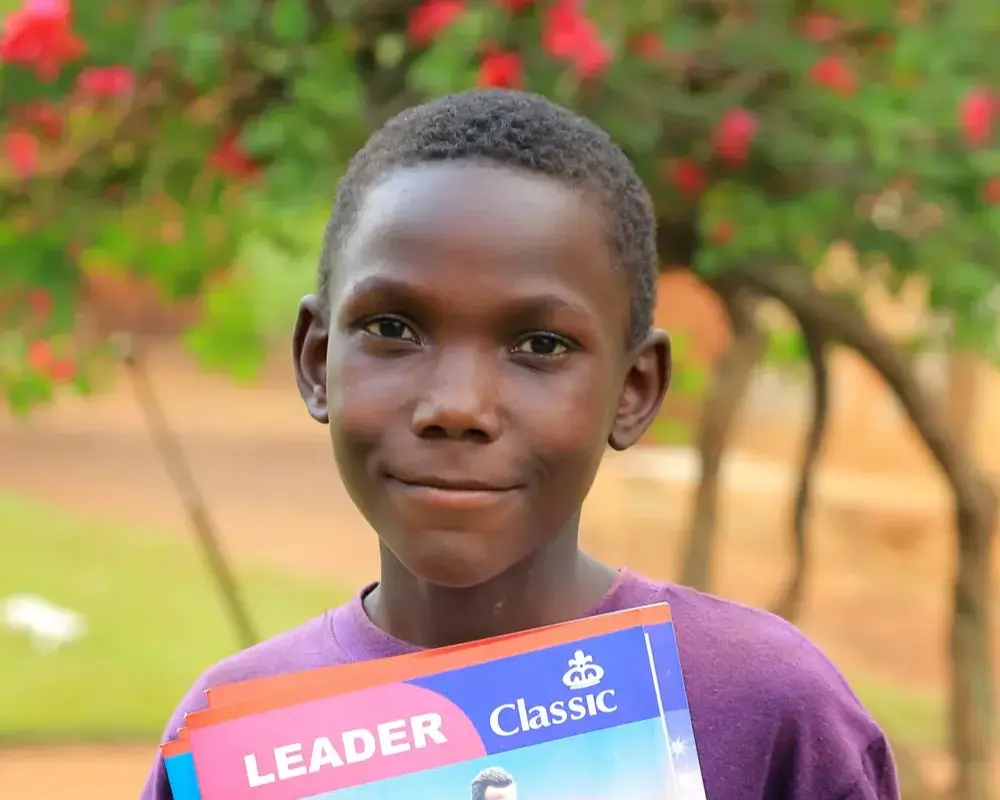 Eriab holding brand-new notebooks