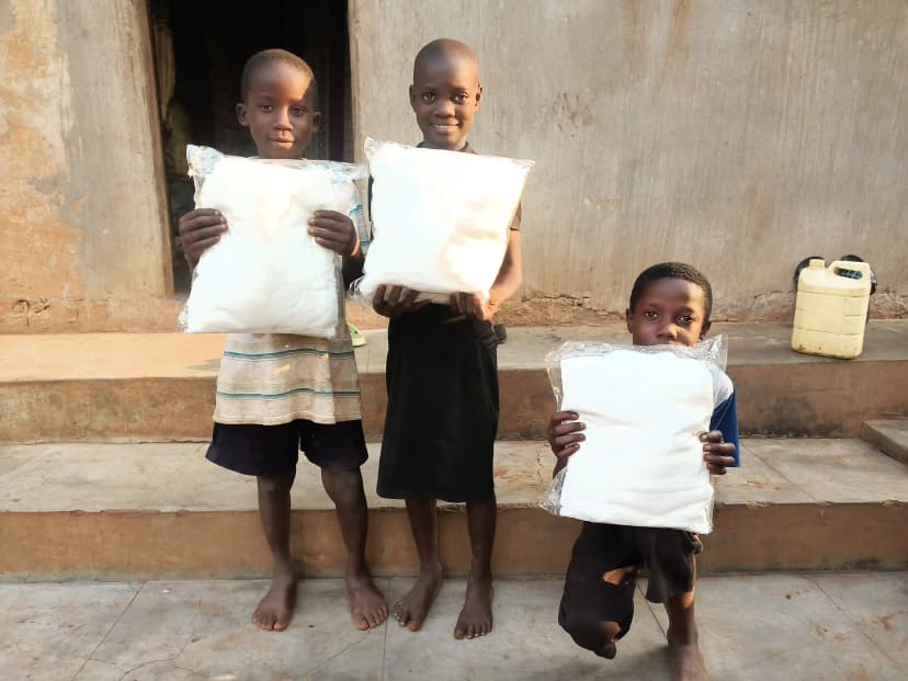 Children protected by mosquito nets for malaria prevention