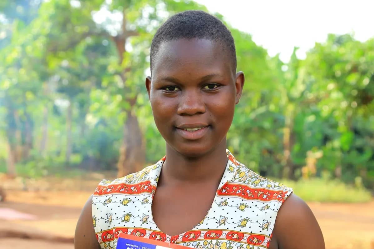 Olivia hugging her new textbooks