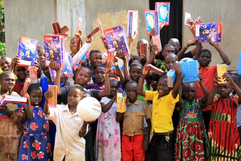Children with new school supplies and uniforms