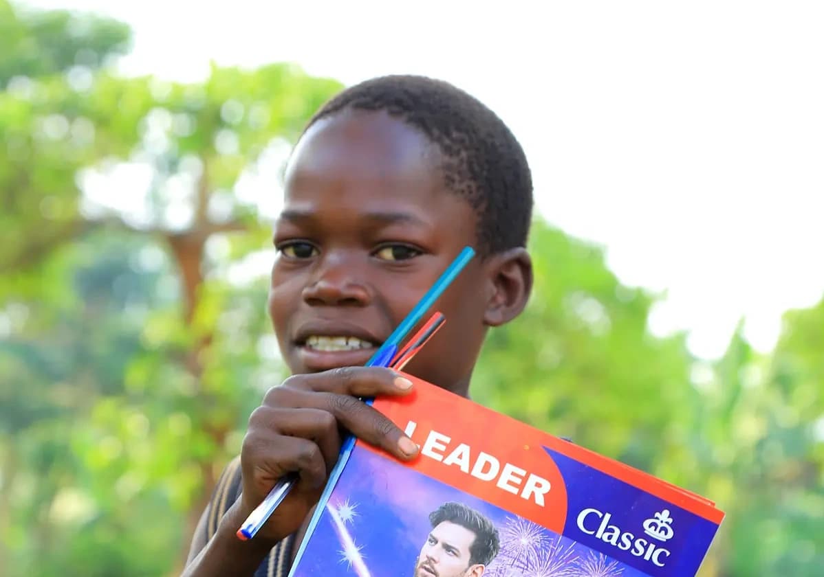 Tadeo showing his textbooks