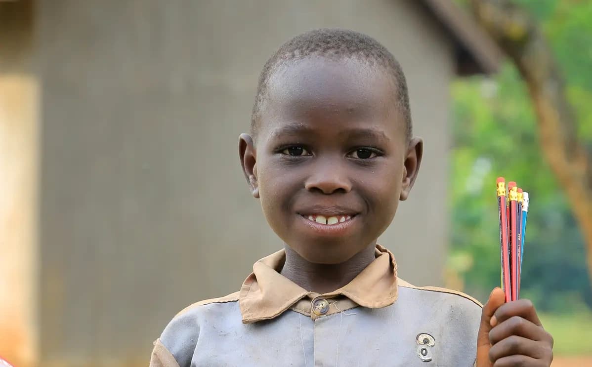 Yasin holding fresh notebooks